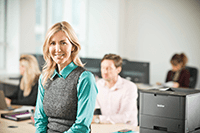 Women sat in front of computer