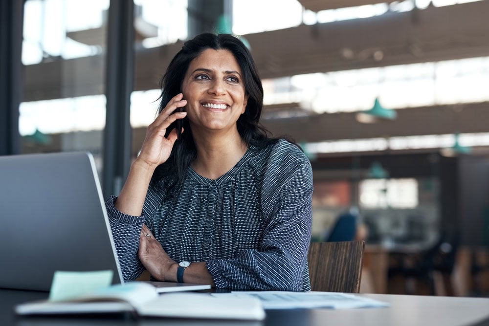 Cards-Website-Laptop-Woman-1000x667