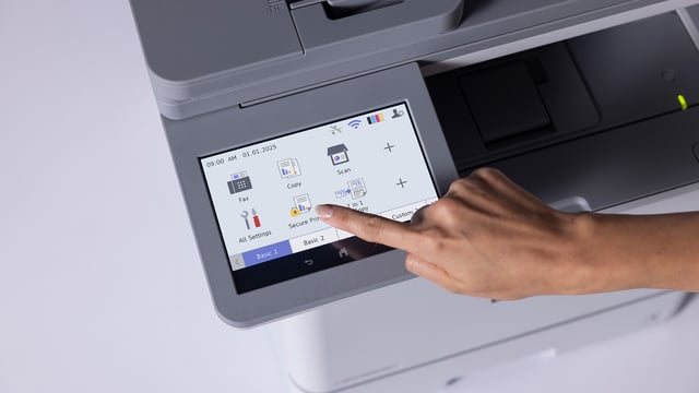 User tapping the Brother MFC-L8970CDW touchscreen