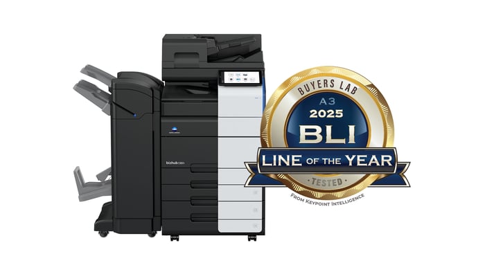 Konica Minolta bizhub C651i multifunction printer alongside the 2025 BLI A3 Line of the Year award badge from Keypoint Intelligence.