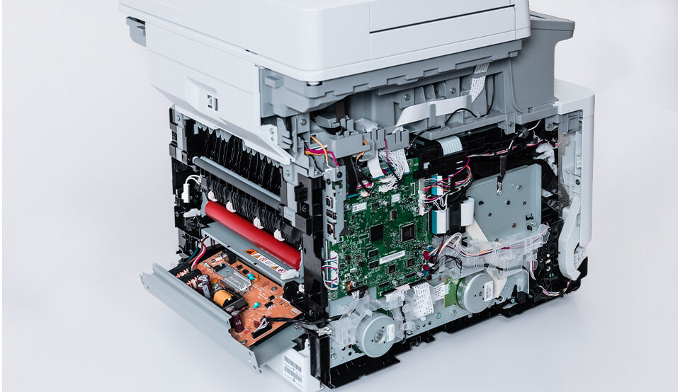 Internal view of a Brother laser printer showing energy-efficient components and power-saving technology.