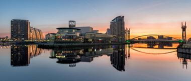 Sunrise at Salford Quays with reflections