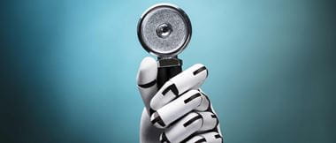 Close-up Of A Robot's Hand Holding Stethoscope