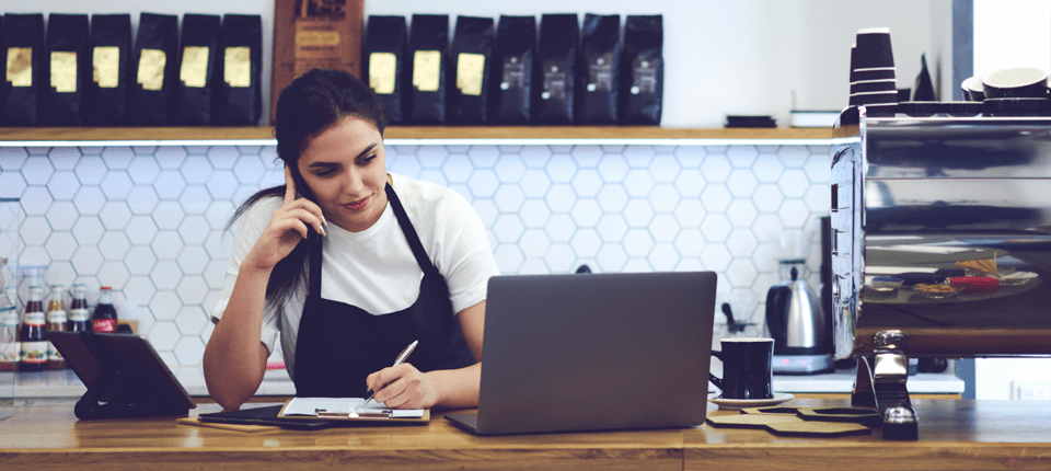 Cafe shop working using laptop