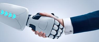White robotic arm shakes hand of a small medium business owner