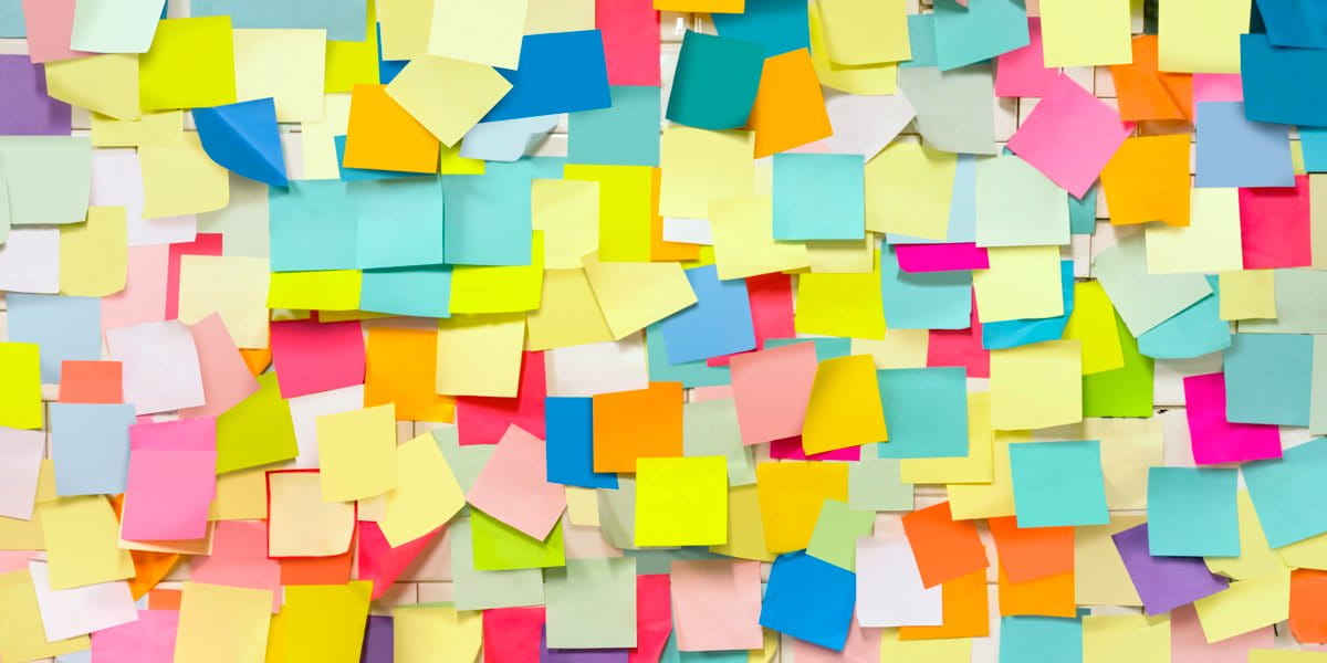wall covered in brightly coloured post-it notes