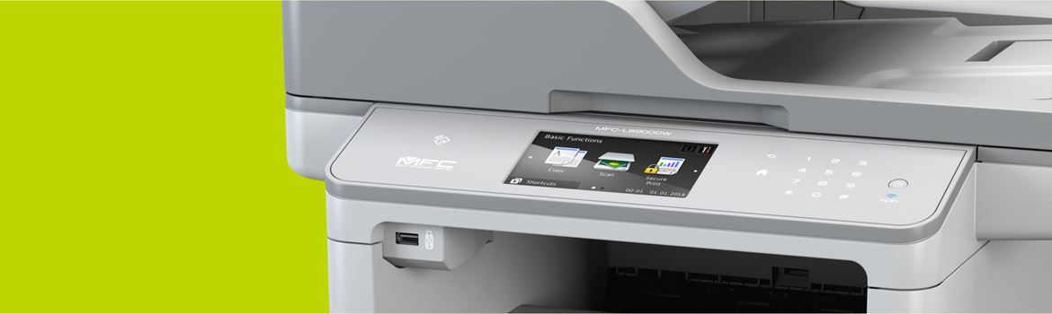 printer against a green backdrop