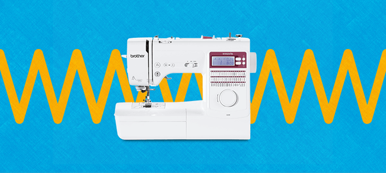 sewing machine on blue and orange zig ziag background