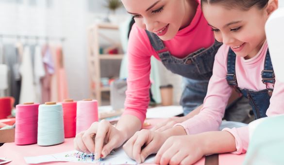mother and child making crafts
