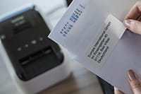 QL-800 label printer with address label printed from Microsoft Excel spreadsheet